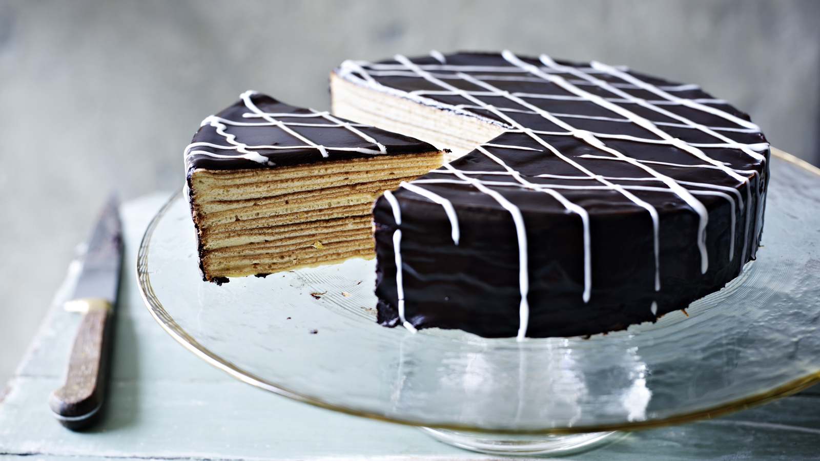 Coconut Layer Cake - Sweetly Cakes With Raffaello and chocolate drip
