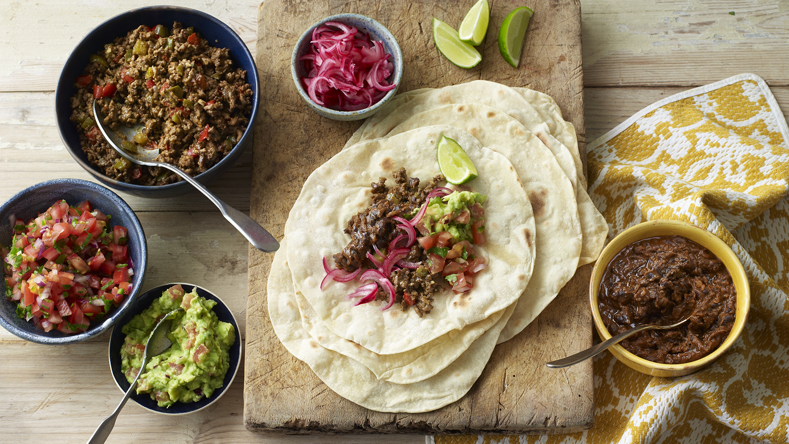 Homemade soft tacos with beef and black beans recipe - BBC Food