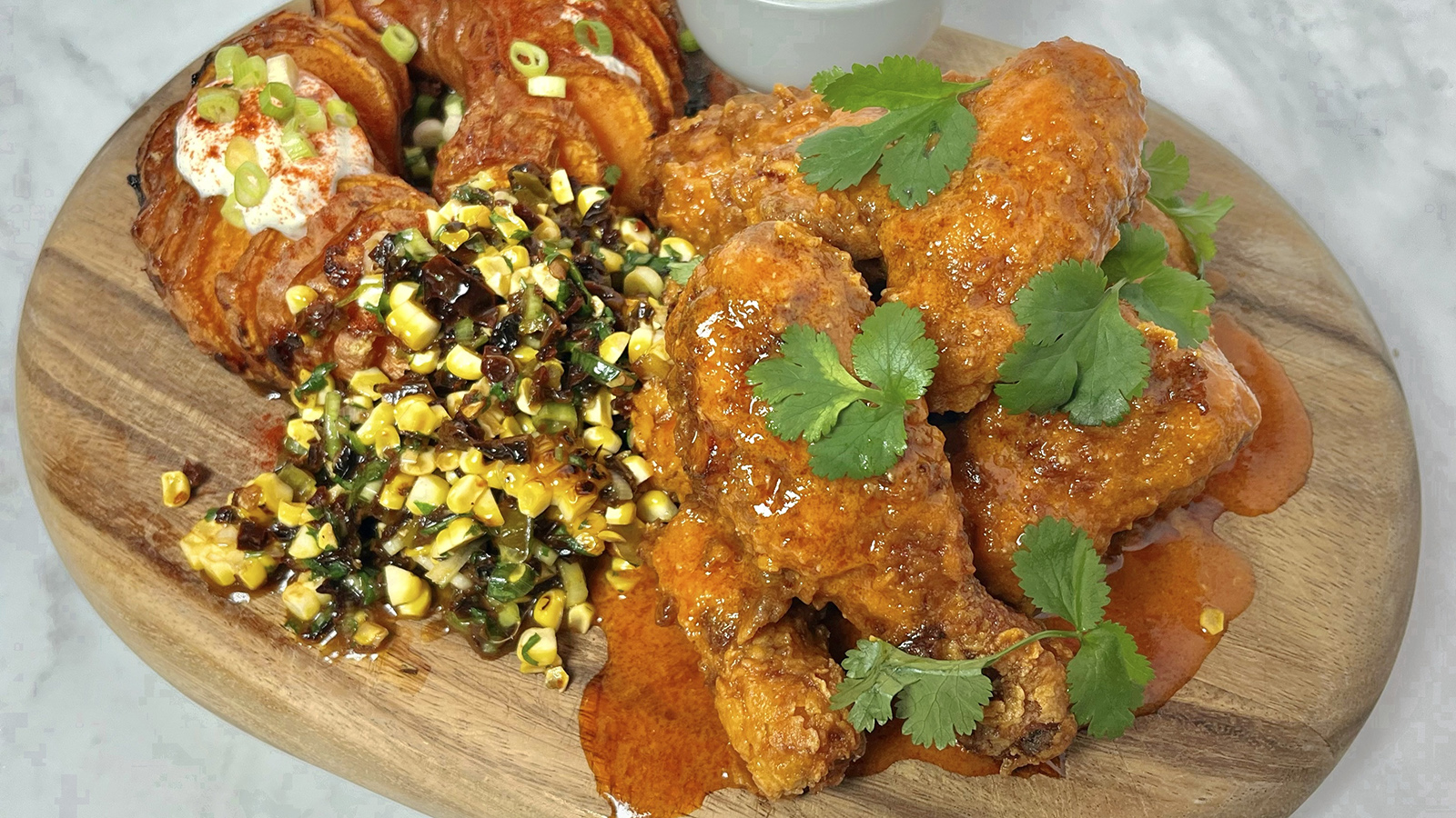 https://food-images.files.bbci.co.uk/food/recipes/buttermilk_chicken_wings_13737_16x9.jpg