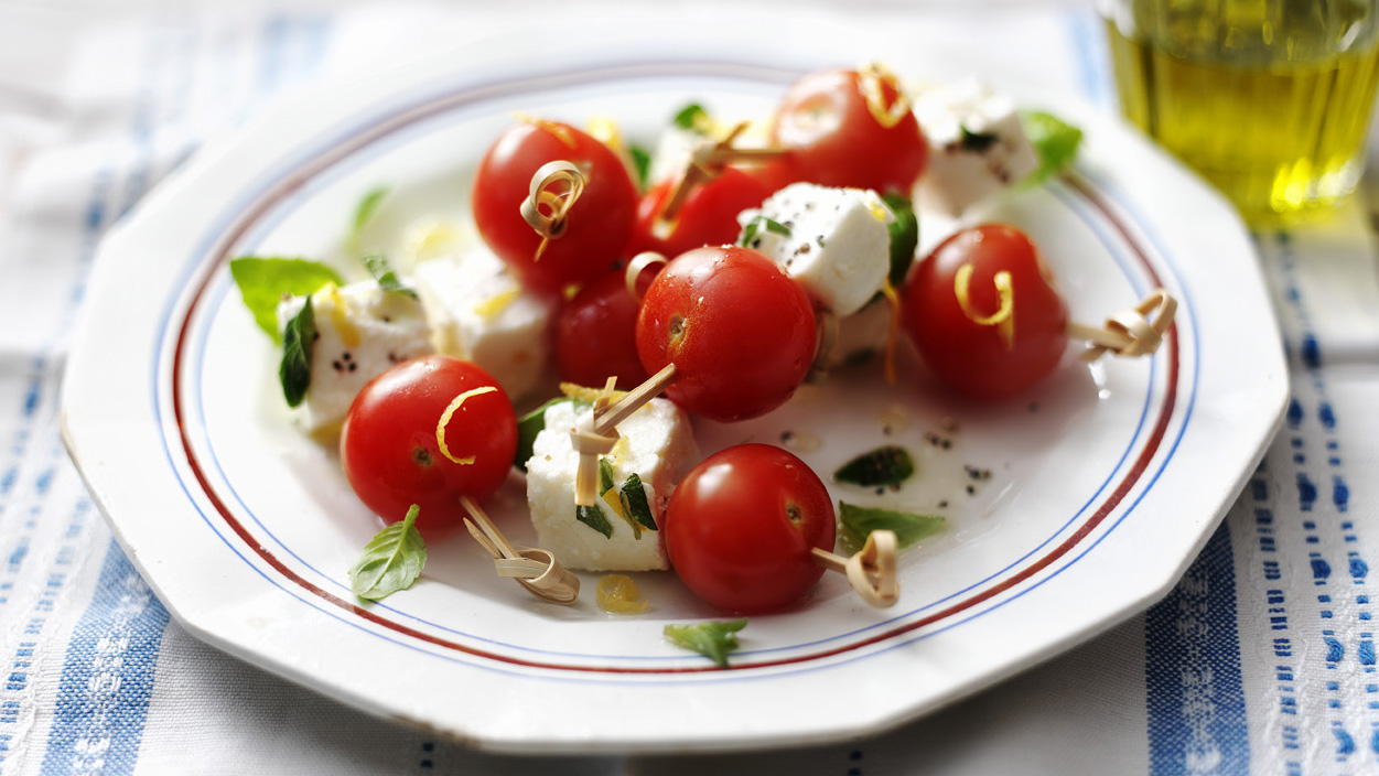 Cherry tomato marinated feta and basil skewers