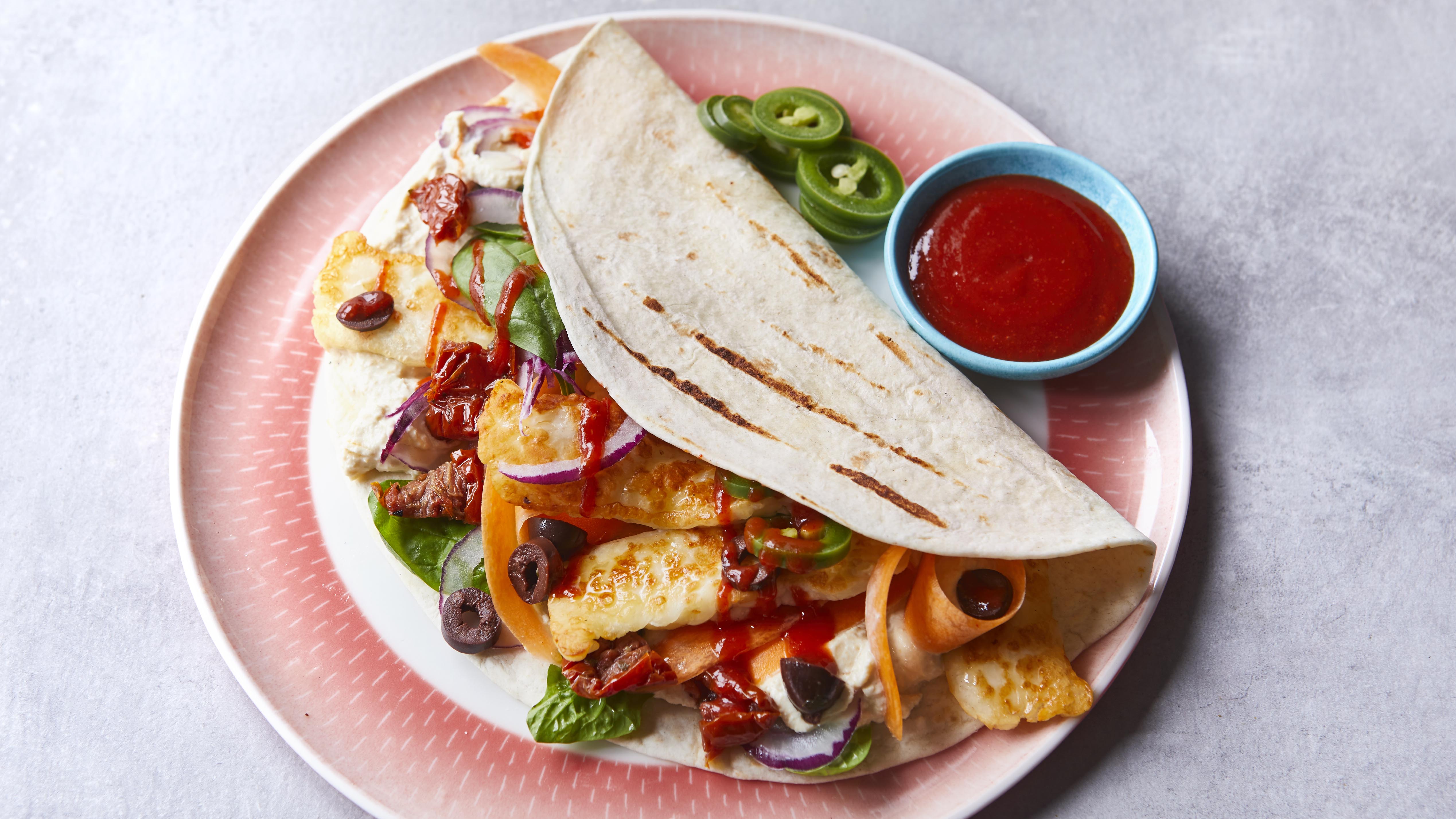 https://food-images.files.bbci.co.uk/food/recipes/easy_halloumi_wrap_57379_16x9.jpg