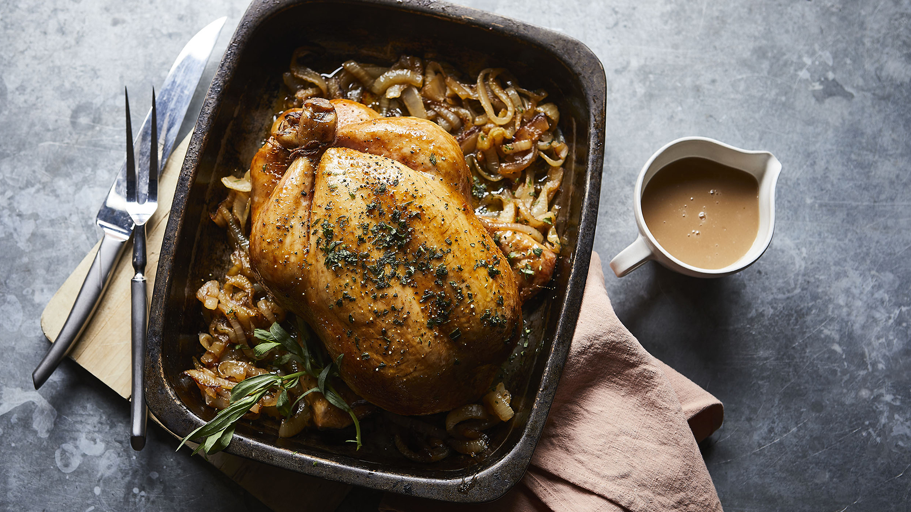 https://food-images.files.bbci.co.uk/food/recipes/roast_chicken_with_57244_16x9.jpg