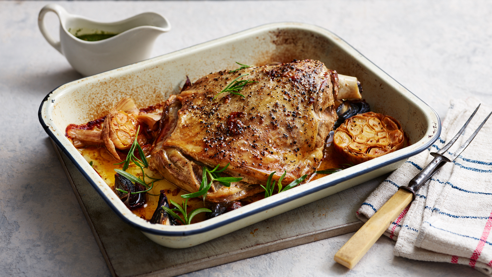 https://food-images.files.bbci.co.uk/food/recipes/slow_roasted_lamb_with_73428_16x9.jpg