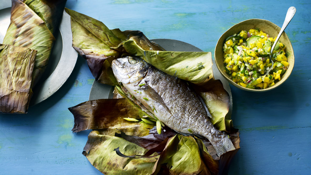 Whole fish cooked in a banana leaf with mango chutney recipe - BBC Food